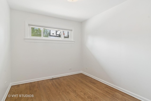 530 S Mitchell Ave, Arlington Heights, IL 60005 - empty room featuring wood finished floors and baseboards