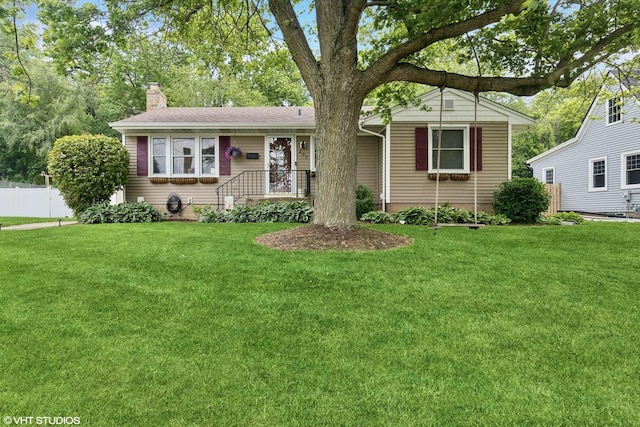 207 S Van Buren St, East Dundee, IL 60118 - view of front facade featuring a chimney