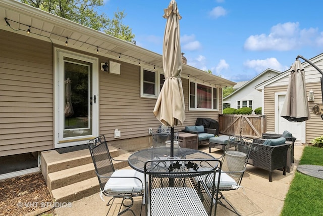 207 S Van Buren St, East Dundee, IL 60118 - view of patio featuring an outdoor hangout area and a gate