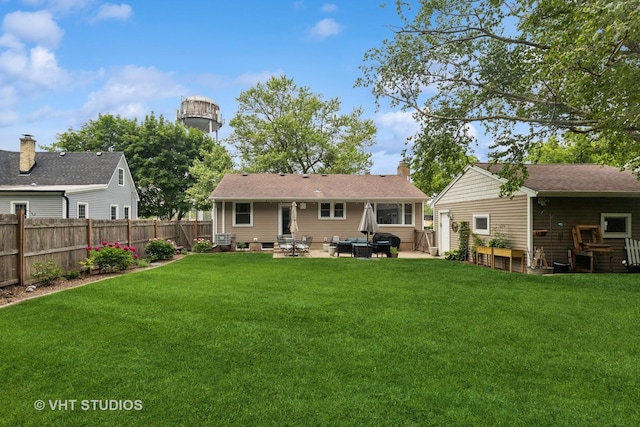207 S Van Buren St, East Dundee, IL 60118 - rear view of house featuring a fenced backyard, a patio area, and entry steps