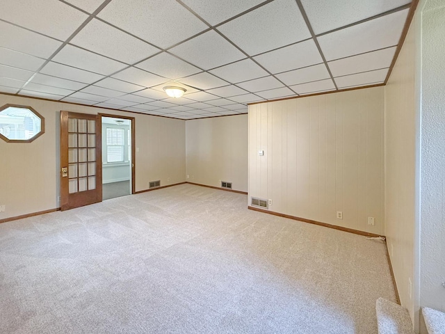111 E Roosevelt St, Freeport, IL 61032 - unfurnished room with carpet flooring, baseboards, and a paneled ceiling