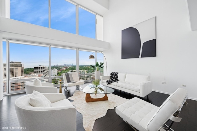 1720 Maple Ave Unit 2710, Evanston, IL 60201 - living area featuring a towering ceiling, wood finished floors, plenty of natural light, and a city view