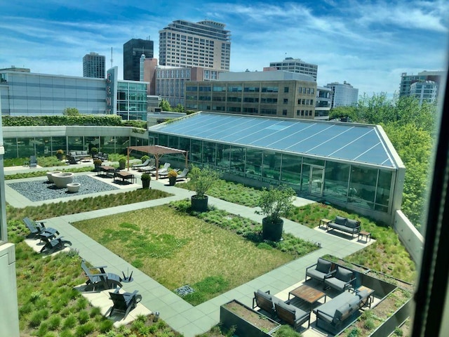 1720 Maple Ave Unit 2710, Evanston, IL 60201 - view of community featuring an outdoor hangout area and a city view