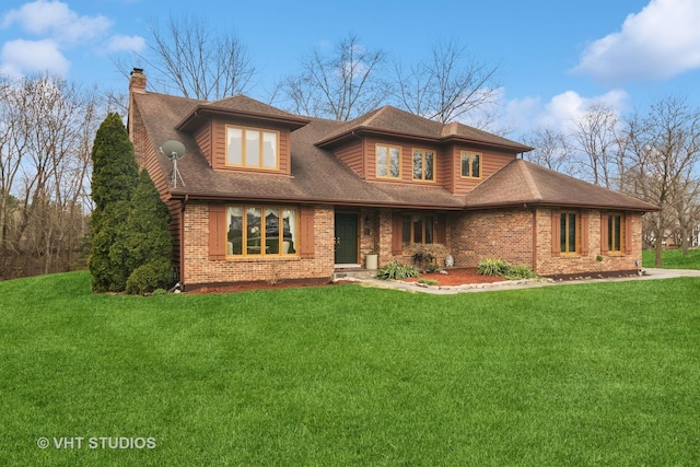 1422 Kirkwall Ct, Inverness, IL 60010 - view of front of home featuring a chimney, a front yard, brick siding, and roof with shingles