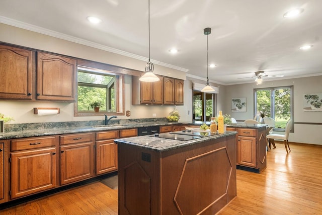 1422 Kirkwall Ct, Inverness, IL 60010 - kitchen with a sink, a kitchen island, light wood finished floors, brown cabinetry, and recessed lighting