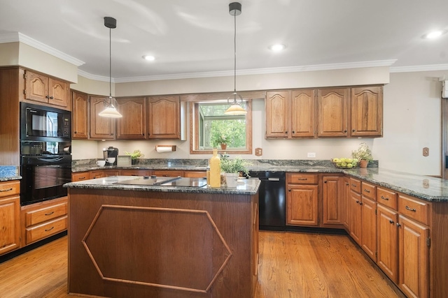 1422 Kirkwall Ct, Inverness, IL 60010 - kitchen with black appliances, brown cabinetry, light wood-style flooring, ornamental molding, and recessed lighting