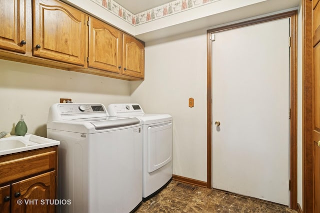 1422 Kirkwall Ct, Inverness, IL 60010 - washroom with washer and dryer, cabinet space, and baseboards