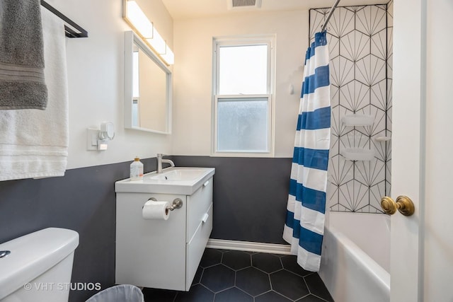 1019 Lyman Ave, Oak Park, IL 60304 - full bathroom featuring vanity, tile patterned floors, and shower / bath combination with curtain