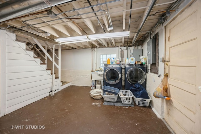 1019 Lyman Ave, Oak Park, IL 60304 - basement featuring washer and dryer, electric panel, and stairs