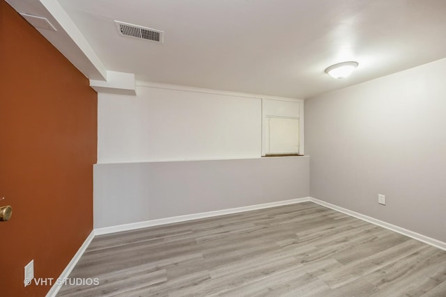 1019 Lyman Ave, Oak Park, IL 60304 - empty room with wood finished floors and baseboards