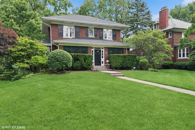 739 Jackson Ave, River Forest, IL 60305 - view of front facade with a front yard and brick siding