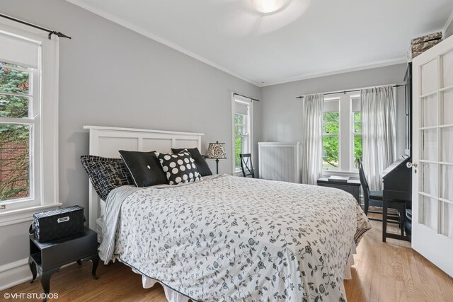 739 Jackson Ave, River Forest, IL 60305 - bedroom with light wood finished floors and ornamental molding
