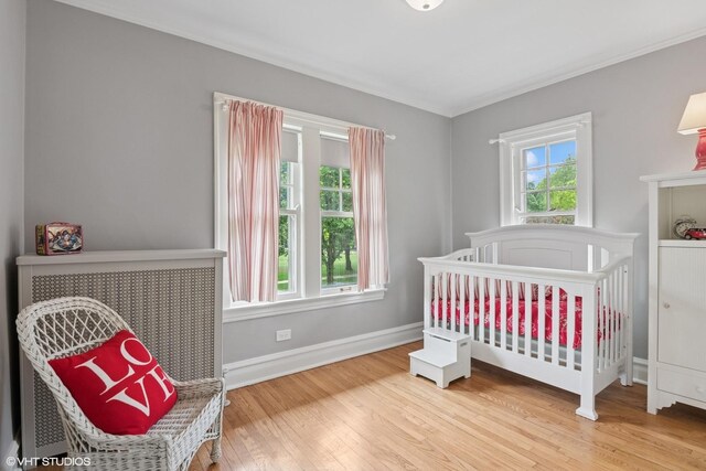 739 Jackson Ave, River Forest, IL 60305 - bedroom with wood finished floors and ornamental molding