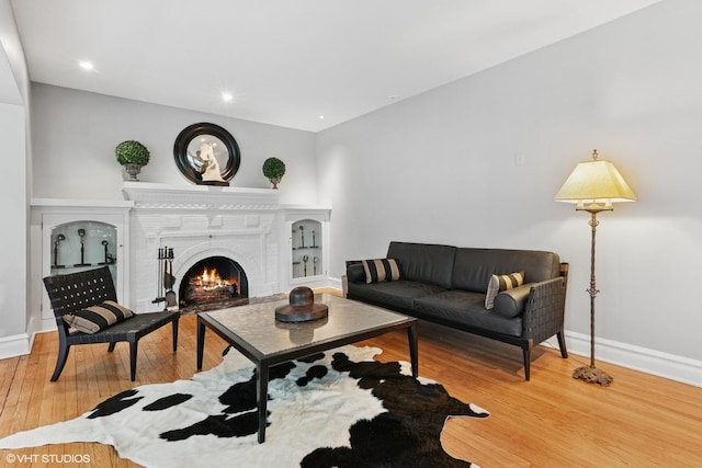 739 Jackson Ave, River Forest, IL 60305 - living room featuring wood finished floors, a lit fireplace, and recessed lighting