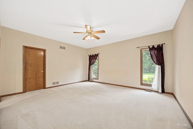 1658 Bayhill Dr, New Lenox, IL 60451 - unfurnished room with plenty of natural light, light carpet, and a ceiling fan