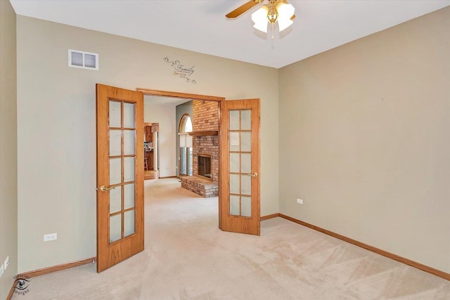 82 Whisper Creek Dr, New Lenox, IL 60451 - unfurnished room featuring french doors, light carpet, and a ceiling fan