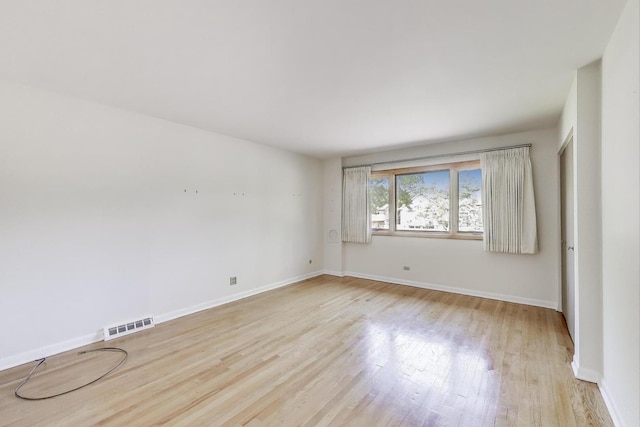 1904 Birch Rd, Northbrook, IL 60062 - empty room featuring light wood-style floors and baseboards