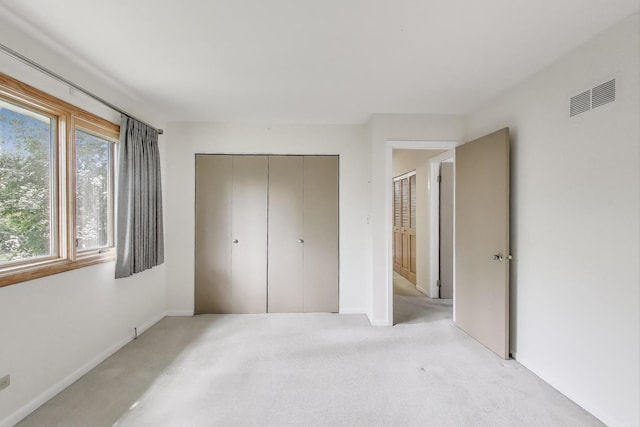 1904 Birch Rd, Northbrook, IL 60062 - unfurnished bedroom with light carpet and a closet