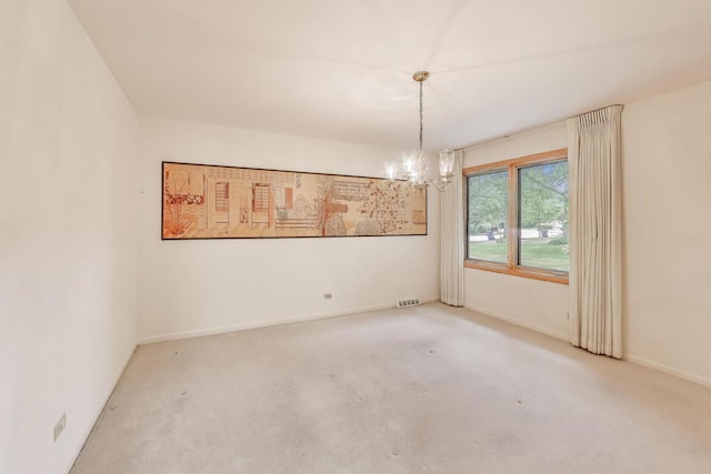 1904 Birch Rd, Northbrook, IL 60062 - carpeted empty room featuring a chandelier and baseboards