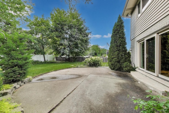 1904 Birch Rd, Northbrook, IL 60062 - fenced backyard with a patio