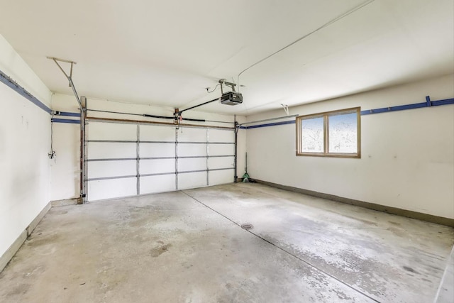 1904 Birch Rd, Northbrook, IL 60062 - garage with a garage door opener and baseboards