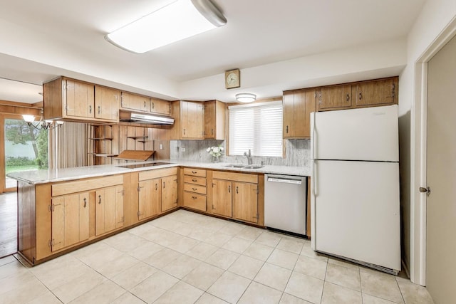 1904 Birch Rd, Northbrook, IL 60062 - kitchen featuring freestanding refrigerator, stainless steel dishwasher, plenty of natural light, and decorative backsplash