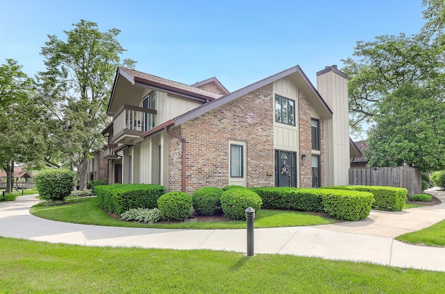 12 Kyle Ct, Willowbrook, IL 60527 - view of side of property featuring a chimney and brick siding