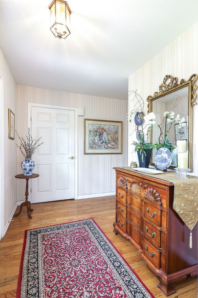 12 Kyle Ct, Willowbrook, IL 60527 - entryway with wallpapered walls, light wood-type flooring, and baseboards
