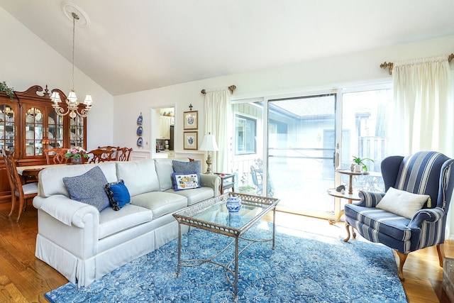 12 Kyle Ct, Willowbrook, IL 60527 - living room with a chandelier, wood finished floors, and high vaulted ceiling
