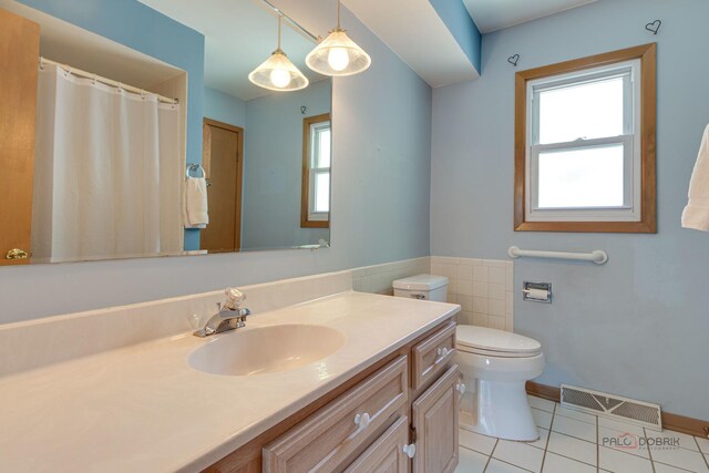 1103 S Belmont Ave, Arlington Heights, IL 60005 - full bathroom with tile patterned floors, vanity, and curtained shower