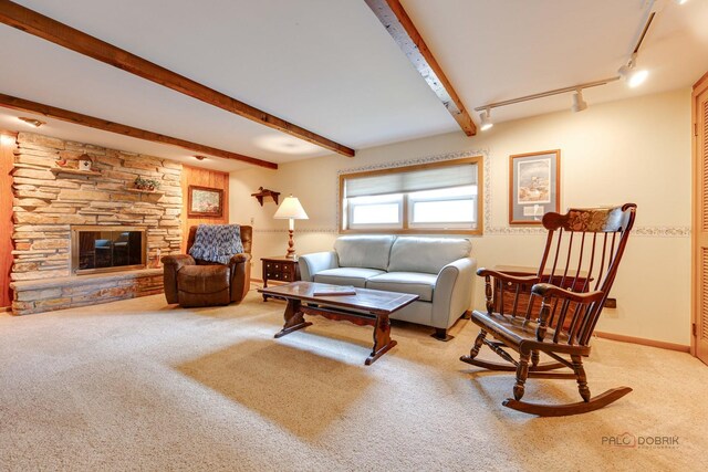1103 S Belmont Ave, Arlington Heights, IL 60005 - living area featuring light colored carpet, beam ceiling, and a fireplace