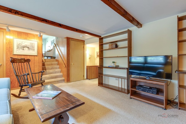 1103 S Belmont Ave, Arlington Heights, IL 60005 - living area with beamed ceiling, rail lighting, carpet flooring, stairway, and wood walls