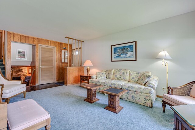 1103 S Belmont Ave, Arlington Heights, IL 60005 - carpeted living area with wood walls and stairs