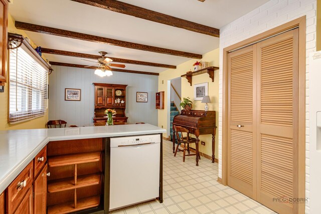 1103 S Belmont Ave, Arlington Heights, IL 60005 - kitchen with white dishwasher, light flooring, beamed ceiling, a peninsula, and light countertops