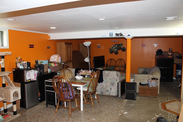 907 N Eddy St, Sandwich, IL 60548 - dining area with crown molding and concrete floors