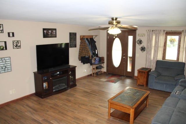 907 N Eddy St, Sandwich, IL 60548 - living room featuring a ceiling fan, wood finished floors, and baseboards