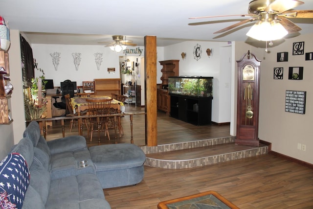 907 N Eddy St, Sandwich, IL 60548 - living room featuring a ceiling fan, wood finished floors, and baseboards