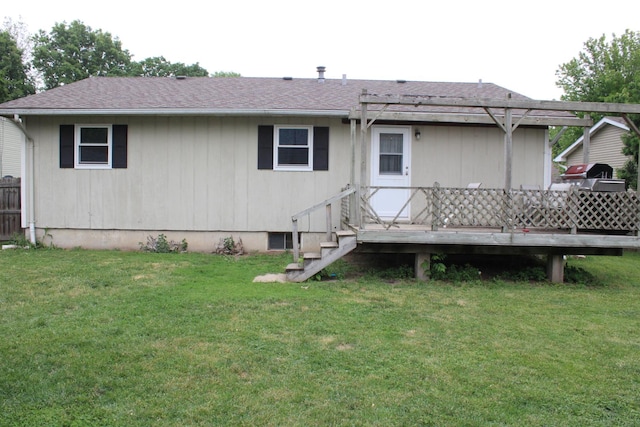 907 N Eddy St, Sandwich, IL 60548 - back of house with a wooden deck, a lawn, and a shingled roof