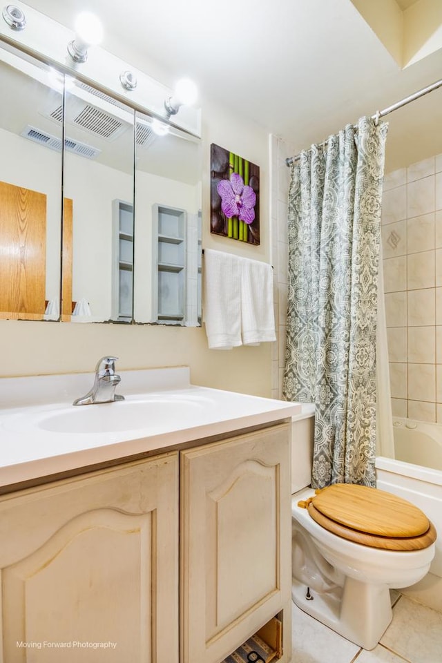 1N559 Newton Ave, Glen Ellyn, IL 60137 - bathroom with vanity, toilet, shower / bath combo with shower curtain, and tile patterned floors