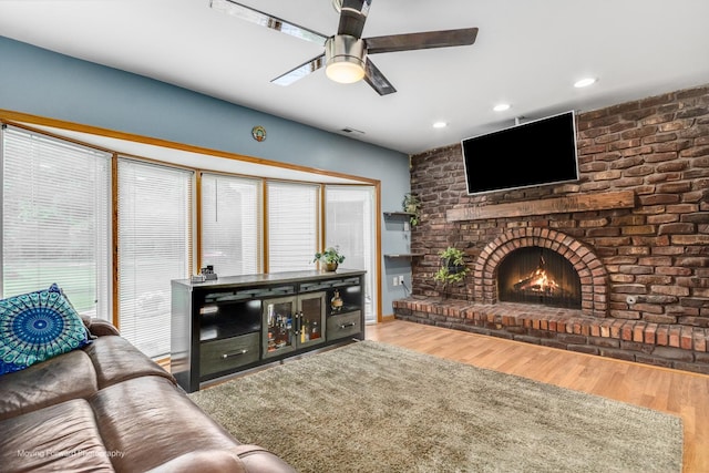 1N559 Newton Ave, Glen Ellyn, IL 60137 - living room with ceiling fan, wood finished floors, a brick fireplace, and recessed lighting