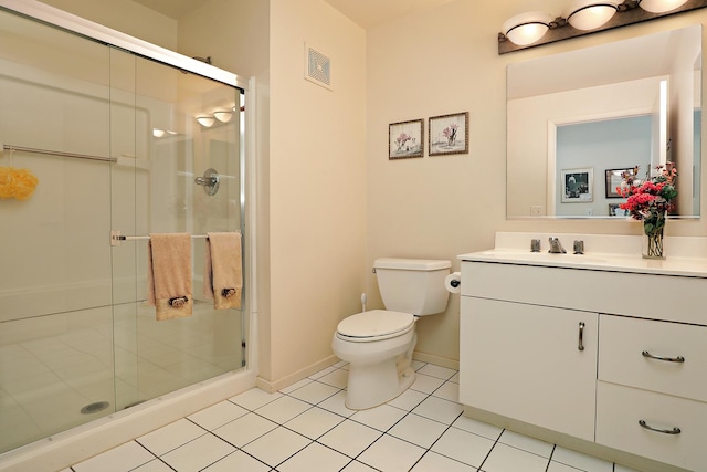 422 Kelburn Rd Unit 223, Deerfield, IL 60015 - bathroom featuring vanity, a stall shower, and tile patterned flooring