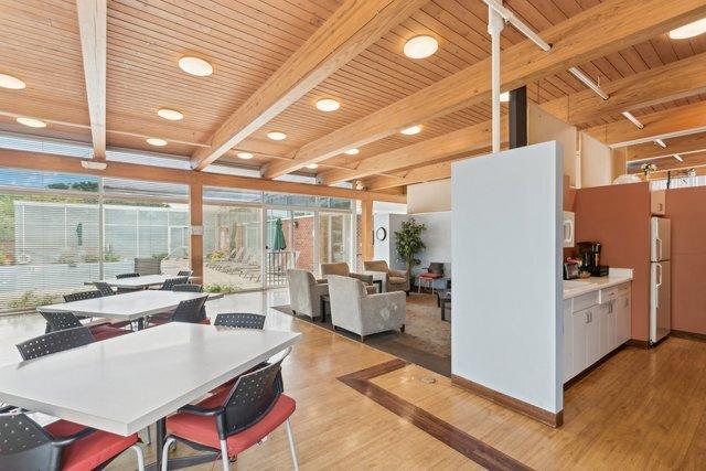 422 Kelburn Rd Unit 223, Deerfield, IL 60015 - dining area featuring light wood-style flooring, a wood ceiling with exposed beams, and recessed lighting