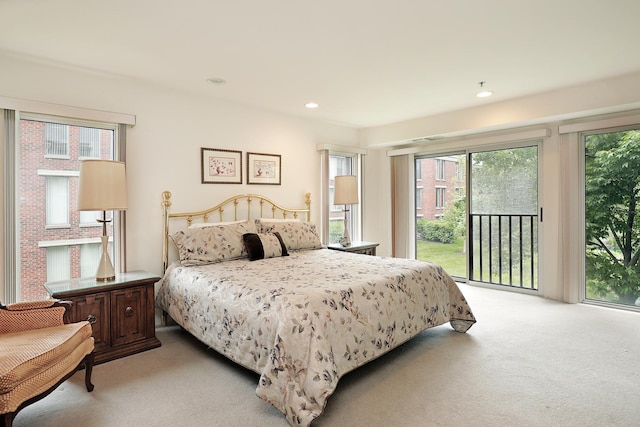 422 Kelburn Rd Unit 223, Deerfield, IL 60015 - bedroom featuring light colored carpet, access to exterior, and recessed lighting