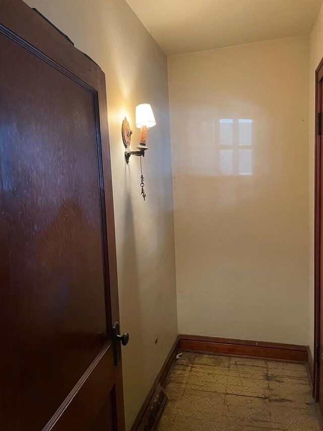 8626 S Burnham Ave, Chicago, IL 60617 - hall featuring baseboards and tile patterned floors