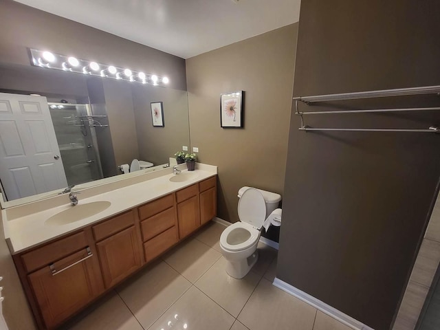3041 W Pope John Paul Ii Dr, Chicago, IL 60638 - bathroom featuring toilet, a shower stall, double vanity, tile patterned floors, and baseboards