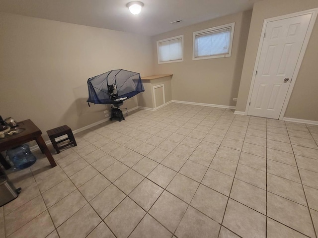 3041 W Pope John Paul Ii Dr, Chicago, IL 60638 - below grade area with light tile patterned floors and baseboards