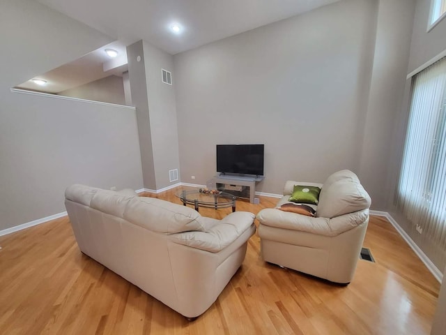3041 W Pope John Paul Ii Dr, Chicago, IL 60638 - living room with light wood-style flooring and baseboards