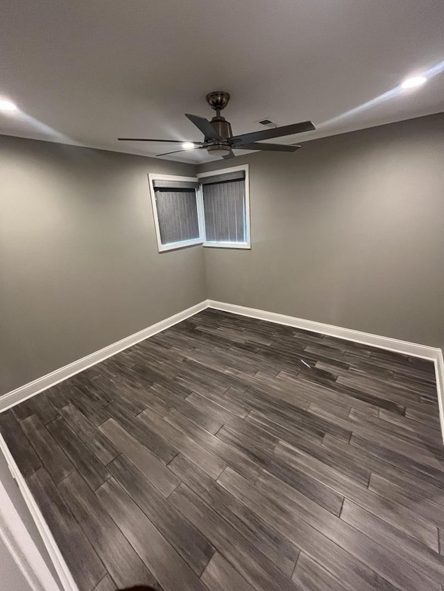 207 Mantua St, Park Forest, IL 60466 - unfurnished room featuring dark wood-type flooring, baseboards, and a ceiling fan
