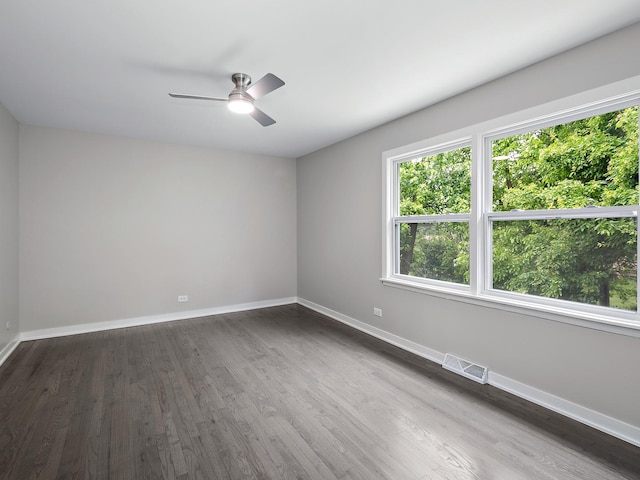 17708 Pebblewood Ln, Hazel Crest, IL 60429 - unfurnished room featuring a ceiling fan, baseboards, and dark wood-style floors