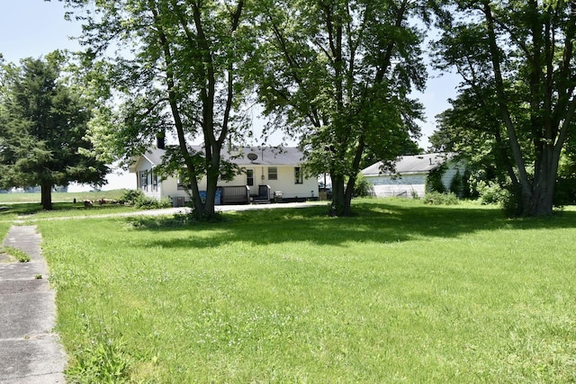 401 W Boundary St, Stanford, IL 61774 - view of grassy yard featuring a patio